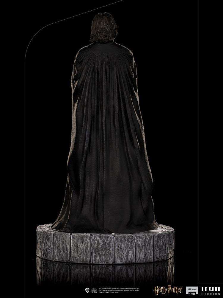Back view of the 22 cm Iron Studios Severus Snape 1/10 scale statue featuring a flowing black cape on a stone base.