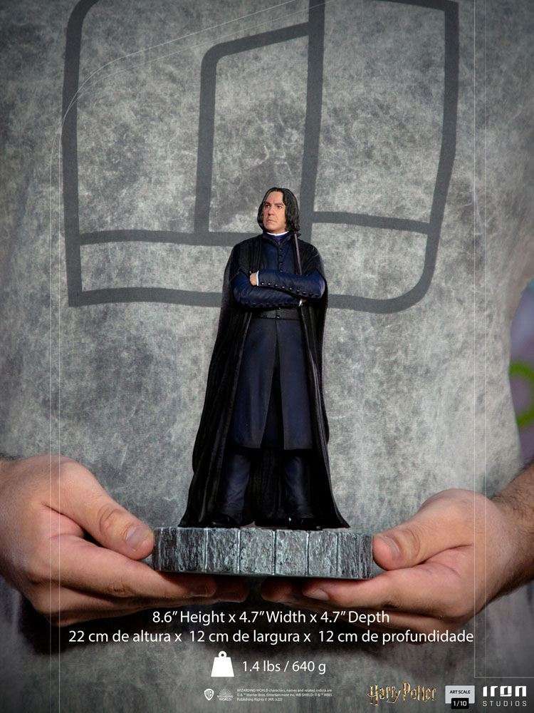 Front view of a 22 cm Iron Studios Severus Snape 1/10 scale statue wearing a black cloak, held in two hands.