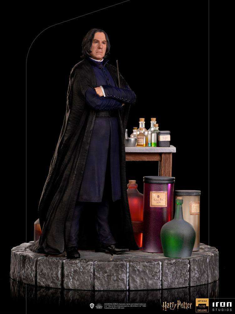 Iron Studios 1/10 scale Severus Snape statue in a black robe, standing on a stone base with potion bottles and a desk.