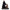 Iron Studios Severus Snape 1/10 scale statue featuring the professor in a black robe beside a potion-filled wooden desk.