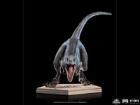 Front view of the 19 cm Iron Studios Blue 1/10 scale statue from Jurassic World, featuring a roaring raptor on a base.