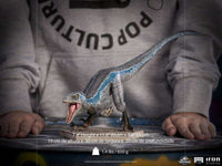 Iron Studios 1/10 scale Blue statue from Jurassic World, featuring a detailed blue and grey raptor on a display base.