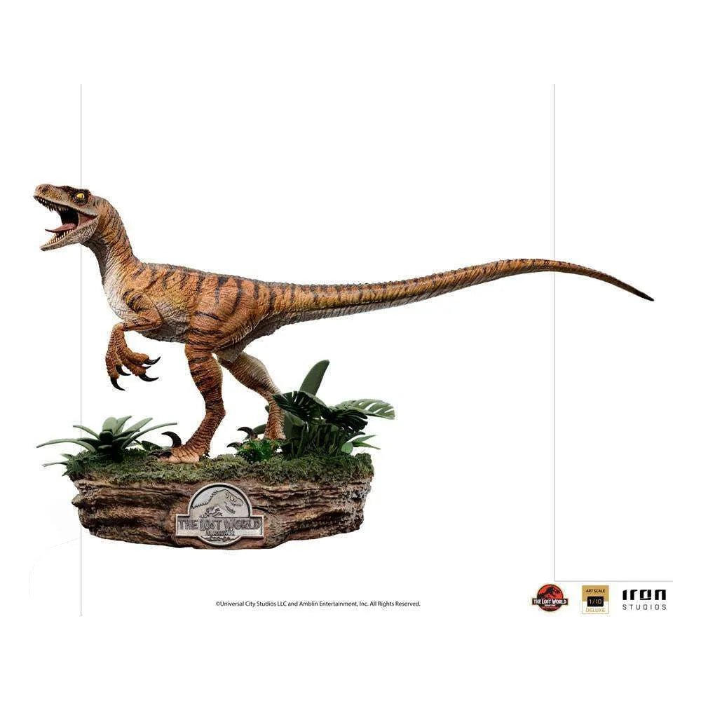 Side view of the Iron Studios 1/10 scale Velociraptor statue from The Lost World on a detailed jungle base.