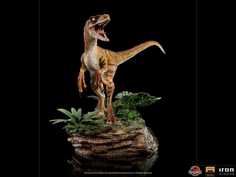 Iron Studios 1/10 scale Velociraptor statue from The Lost World, featuring a detailed dinosaur on a jungle base.