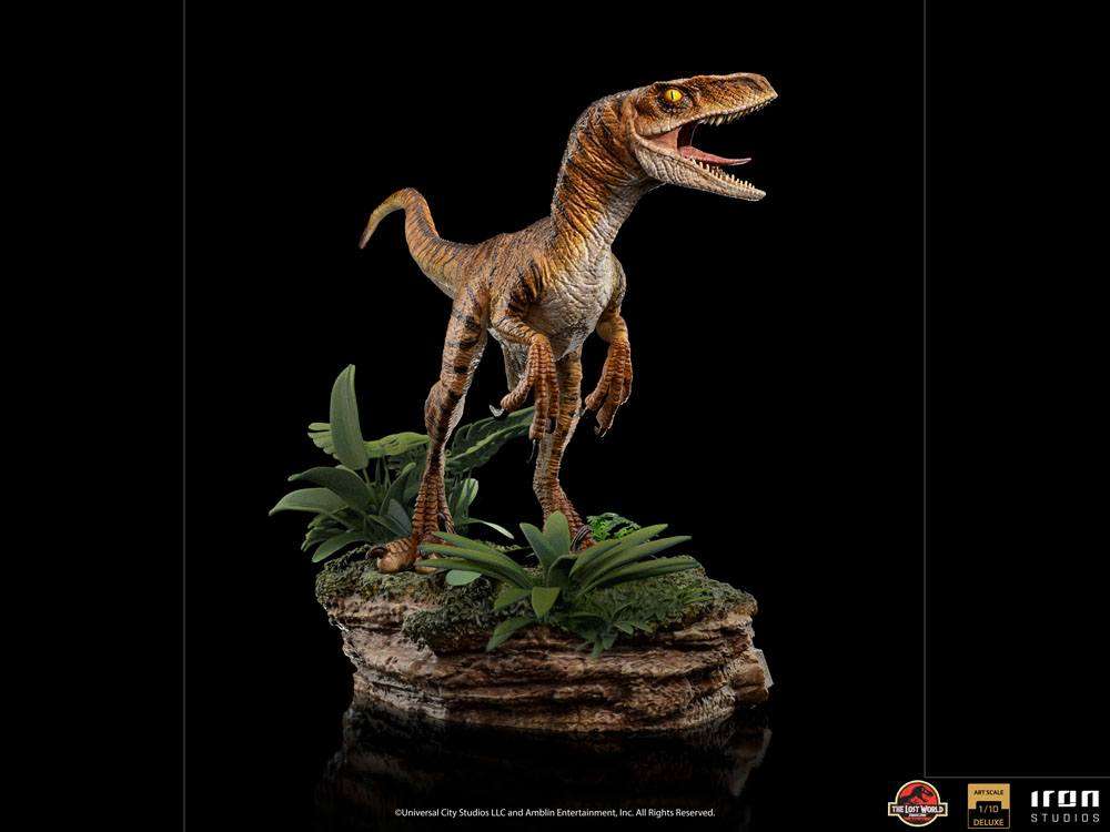 Iron Studios 1/10 scale Velociraptor statue from The Lost World, featuring a detailed brown dinosaur on a jungle base.