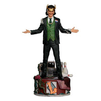 Iron Studios Loki President Variant 1/10 scale statue featuring the character in a suit on a detailed display base.