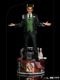 Iron Studios 1/10 scale Loki President statue in a suit with horned helmet, standing on a detailed themed base.