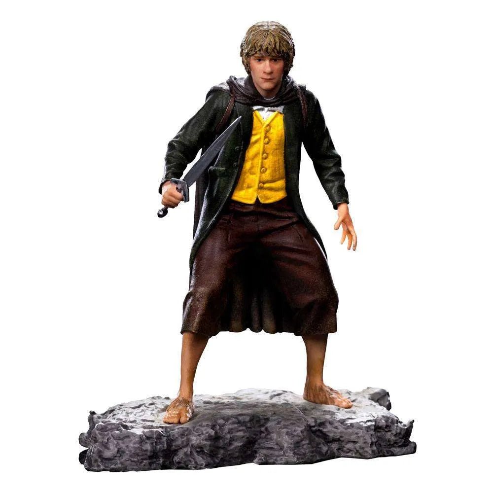 Iron Studios 1/10 scale Merry statue from Lord of the Rings, featuring the hobbit holding a sword on a rocky base.