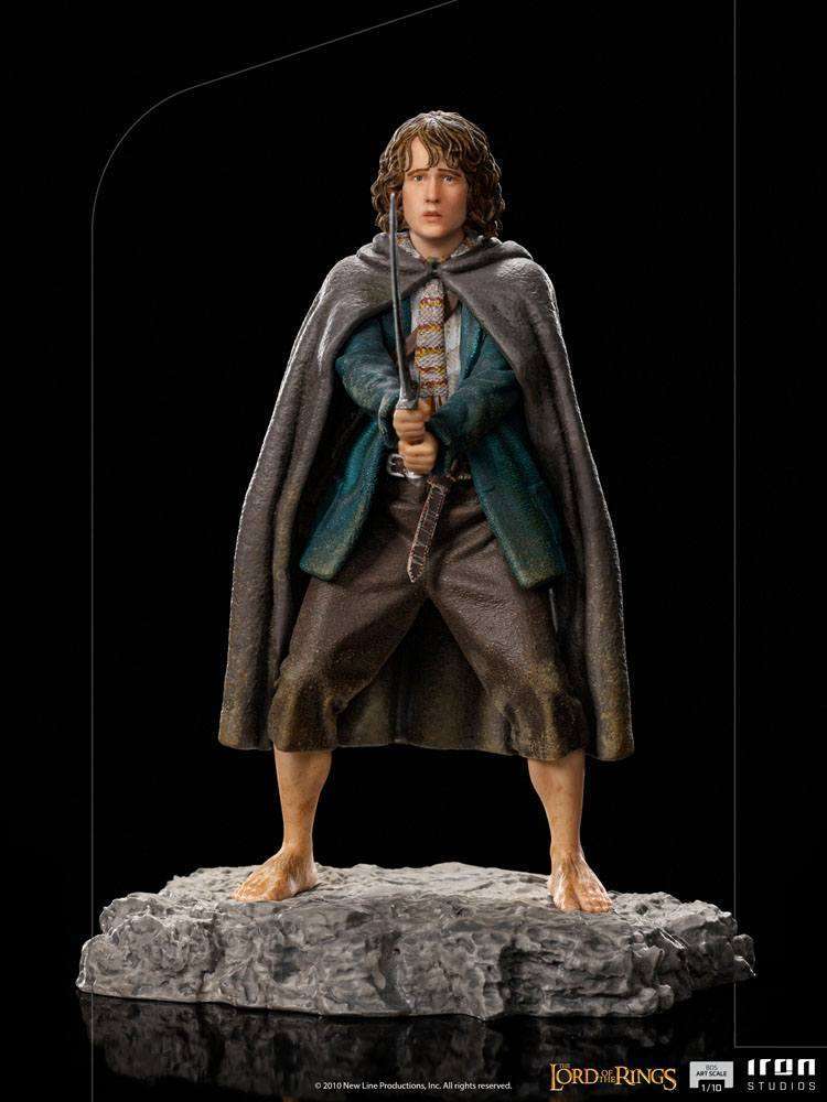 Iron Studios 1/10 scale Pippin statue from Lord of the Rings, featuring the hobbit holding a sword on a rocky base.