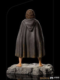 Back view of the 12 cm Iron Studios Pippin BDS Art Scale statue wearing a textured brown hooded cloak on a rocky base.