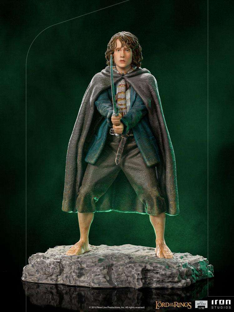 Iron Studios 1/10 scale Pippin statue from Lord of the Rings, featuring the hobbit holding a sword on a rocky base.