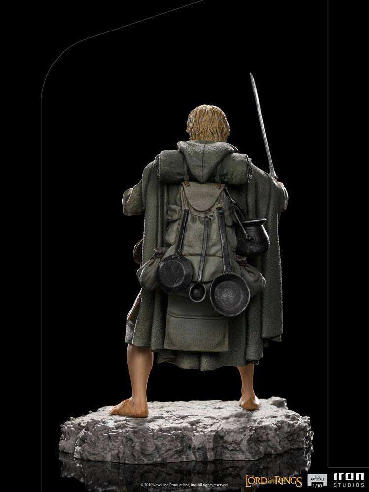 Rear view of Iron Studios Sam 1/10 scale statue, featuring detailed travel gear, cooking pans, and cloak on a rock base.