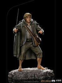 Front view of Iron Studios Sam 1/10 scale statue, featuring the hobbit holding a sword on a rocky base.