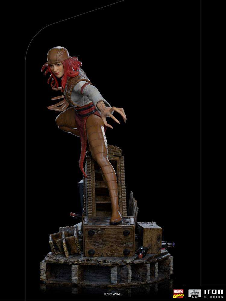 Side view of the 21cm Iron Studios Lady Deathstrike statue featuring red hair, clawed hands, and a detailed base.