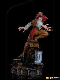 Back view of the 21 cm Iron Studios Lady Deathstrike statue, featuring her long claws and detailed base.