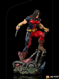 Iron Studios 1/10 Warpath X-Men statue in a dynamic pose, featuring red and blue costume details and dual blades.