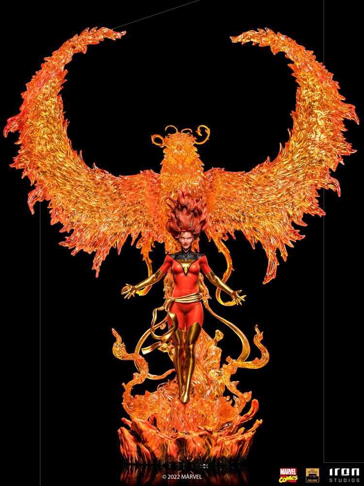 Iron Studios 1/10 Phoenix statue featuring a red-and-gold costume with a massive, translucent orange fire bird effect.