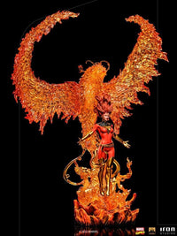 Iron Studios 1/10 Phoenix statue featuring Jean Grey in a red costume before a translucent orange flame bird effect.