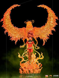 Iron Studios 1/10 Phoenix statue featuring Jean Grey in her red costume with a translucent, fiery phoenix wings base.