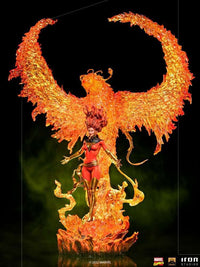 Iron Studios 1/10 Phoenix statue featuring a red-suited Jean Grey standing before a translucent orange flame phoenix.