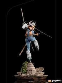 Rear view of Iron Studios Spiral 1/10 scale statue featuring six arms, swords, and white fur boots on a stone base.