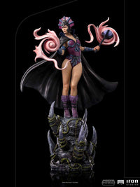 Iron Studios Evil-Lyn 1/10 scale statue featuring purple armor, a black cape, and magic effects on a rocky base.
