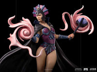 Iron Studios Evil-Lyn 1/10 scale statue featuring a purple costume, black cape, and magical pink energy effects.