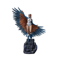 Iron Studios Sorceress 1/10 scale statue featuring blue and brown wings, white bodysuit, and rocky base, front view.