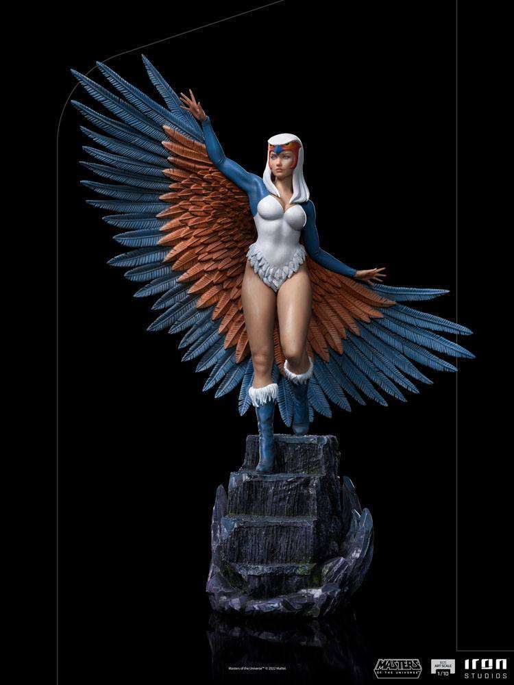 Iron Studios Sorceress 1/10 scale statue featuring blue and orange wings, white bodysuit, and rocky base, front view.