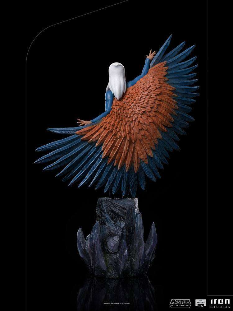 Back view of Iron Studios Sorceress 1/10 scale statue featuring detailed orange and blue wings on a rocky base.