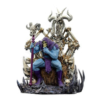 Iron Studios Skeletor on Throne Deluxe 1/10 scale statue featuring a blue-skinned Skeletor holding a staff on a bone throne.