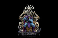 Front view of Iron Studios Skeletor on Throne Deluxe statue, featuring a blue-skinned Skeletor holding a Havoc Staff.
