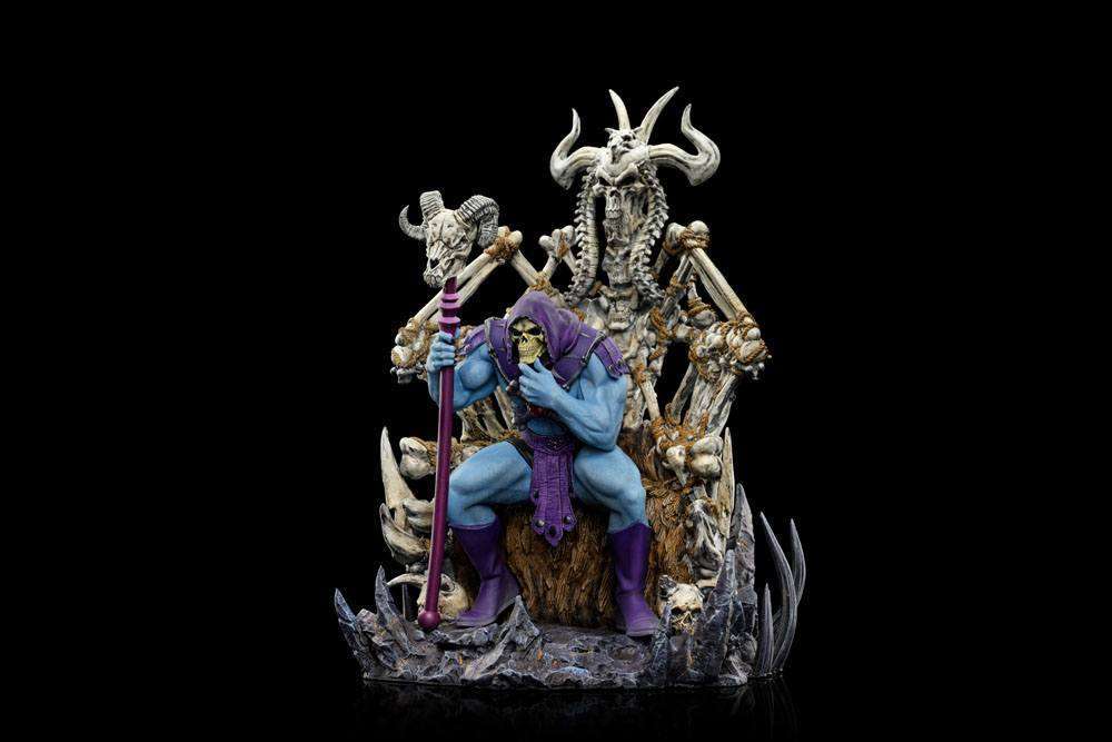 Iron Studios Skeletor on Throne Deluxe 1/10 scale statue featuring a blue Skeletor sitting on a detailed bone throne.