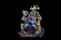 Iron Studios Skeletor on Throne Deluxe 1/10 scale statue featuring a blue Skeletor sitting on a detailed bone throne.