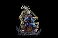 Iron Studios Skeletor on Throne Deluxe 1/10 scale statue featuring a blue Skeletor holding a staff on a bone-themed throne.