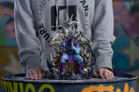 Iron Studios Skeletor on Throne Deluxe 1/10 scale statue featuring a blue-skinned Skeletor sitting on a bone throne.