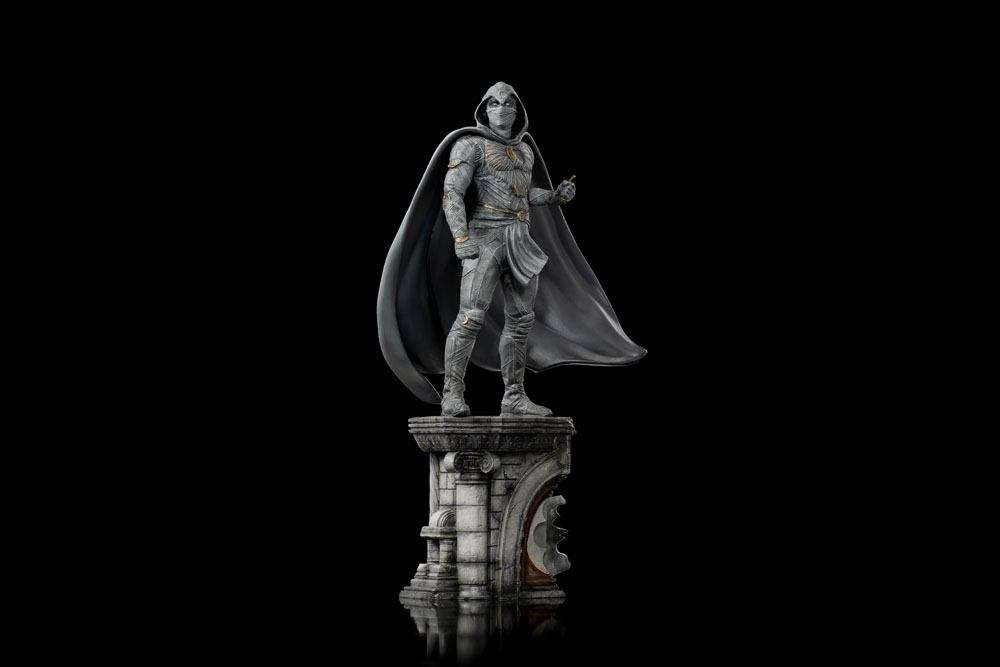 Iron Studios 30 cm Moon Knight 1/10 scale statue in a white hooded costume standing on an ornate stone pedestal.