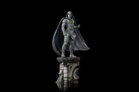 Iron Studios 30 cm Moon Knight 1/10 scale statue in a white hooded costume standing on an ornate stone pedestal.