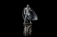 Iron Studios Moon Knight 1/10 scale statue in white costume with flowing cape, standing on a detailed stone base.