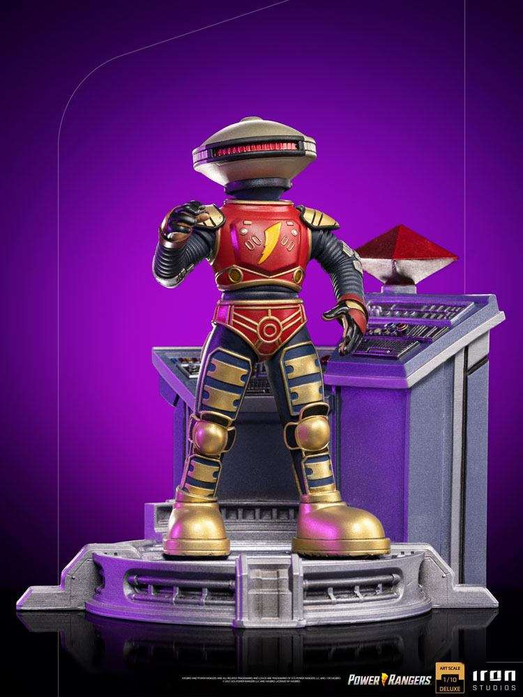 Iron Studios Alpha 5 1/10 scale statue in red, gold, and black standing on a detailed command center base.