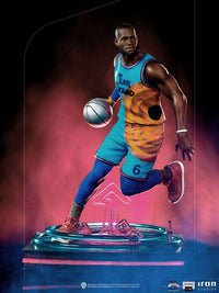 Iron Studios 1/10 LeBron James statue from Space Jam: A New Legacy in a dynamic basketball pose on a neon base.