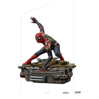 Iron Studios Spider-Man: No Way Home 1/10 scale statue in a dynamic crouching pose on a detailed industrial base.