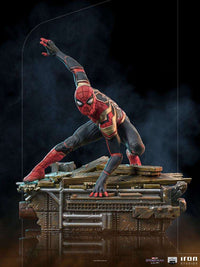 Iron Studios Spider-Man No Way Home 1/10 scale statue in a dynamic crouched pose on a detailed industrial base.