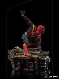 Iron Studios Spider-Man No Way Home 1/10 scale statue in a dynamic crouching pose on a detailed debris base.