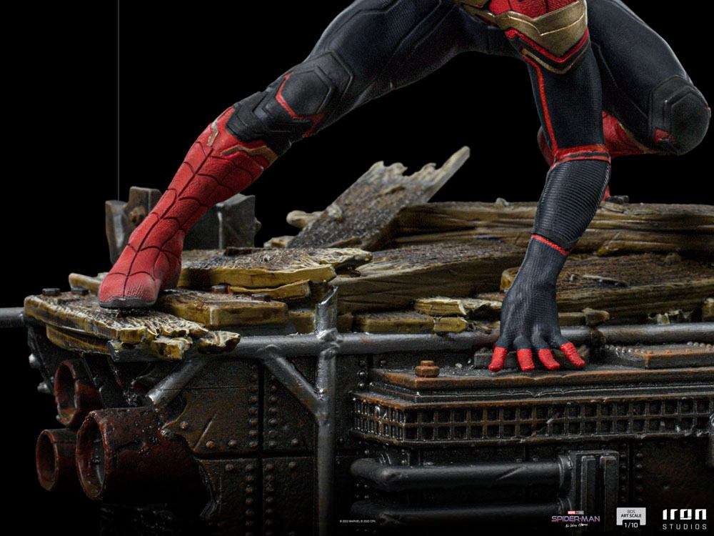 Close-up of Iron Studios Spider-Man No Way Home 1/10 scale statue showing the red and black suit on a debris base.