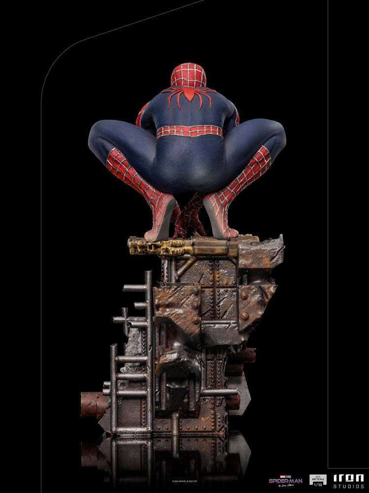 Back view of Iron Studios Spider-Man No Way Home 1/10 scale statue crouching on a detailed industrial rubble base.