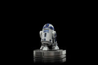 Rear view of the 13 cm Iron Studios R2-D2 Star Wars Art Scale statue featuring blue and white metallic details.