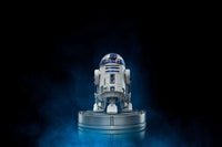 Front view of the 13 cm Iron Studios R2-D2 Star Wars Art Scale statue in white and blue on a circular display base.
