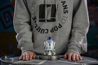Front view of the 13 cm Iron Studios R2-D2 Star Wars Art Scale statue standing on a circular display base.