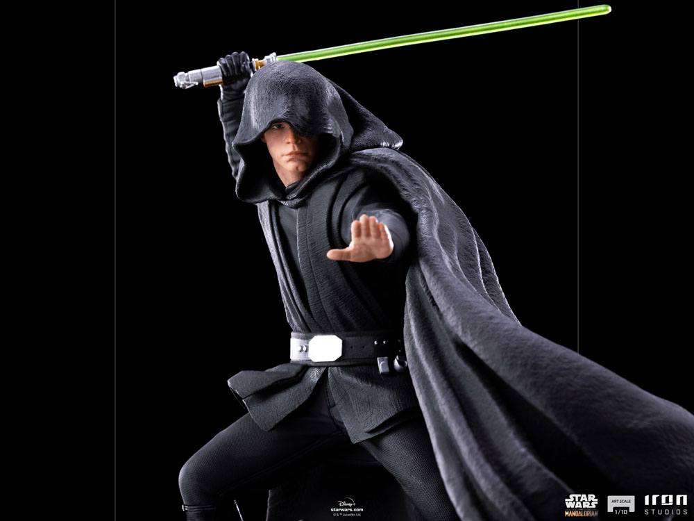 Iron Studios Luke Skywalker 1/10 scale statue in black robes with a green lightsaber in a dynamic combat pose.